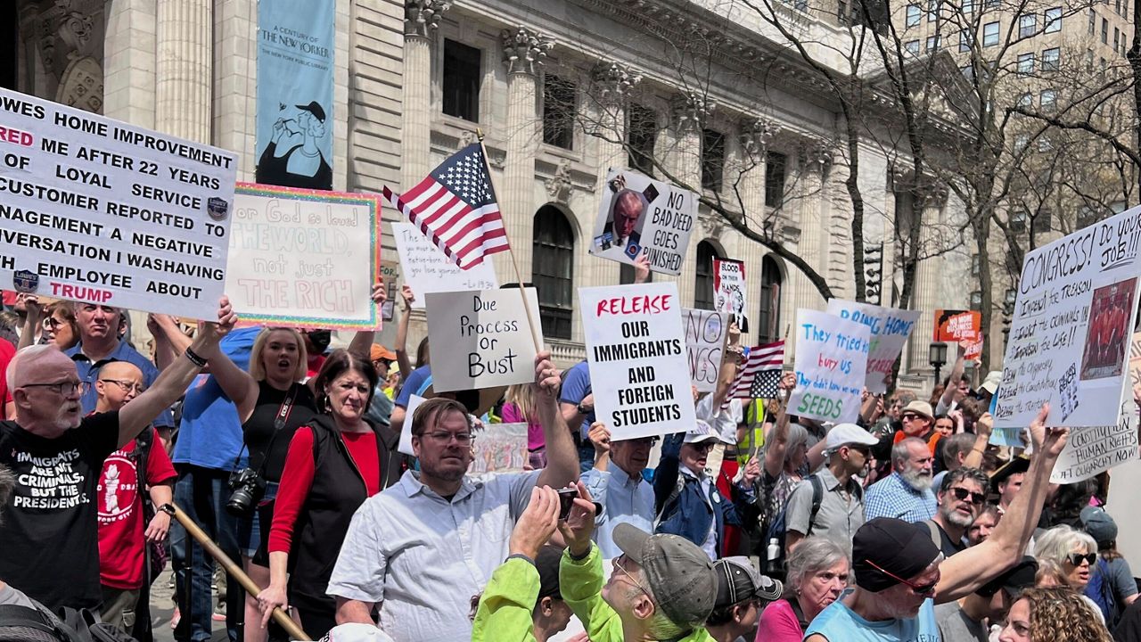 protesters-march-through-midtown-decrying-trump’s-immigration-policies