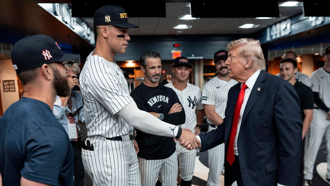 trump-draws-cheers-and-boos-while-marking-9/11-by-attending-a-new-york-yankees-game