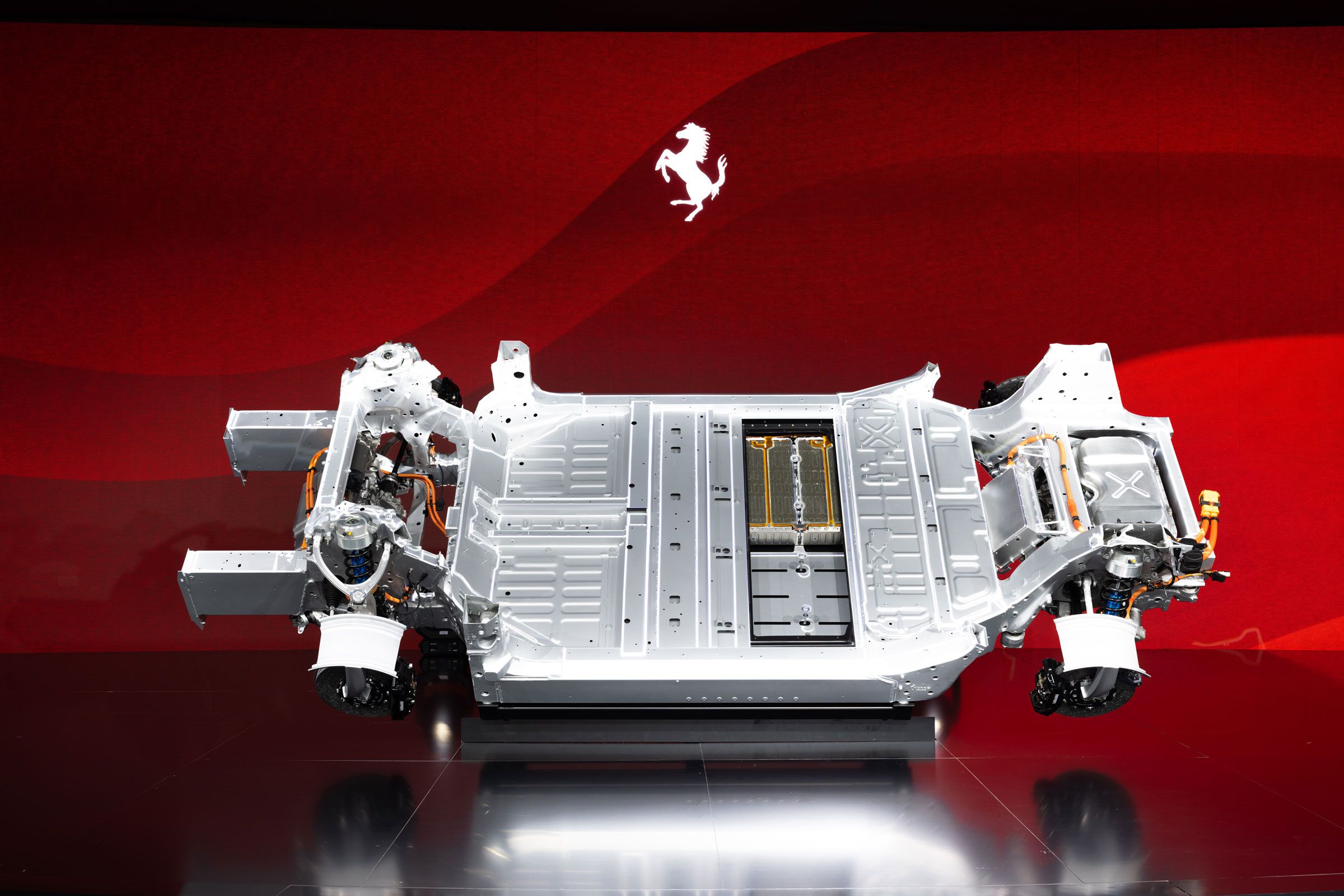 ferrari-reveals-its-electric-powerhouse,-and-what-could-finally-be-real-ev-sound